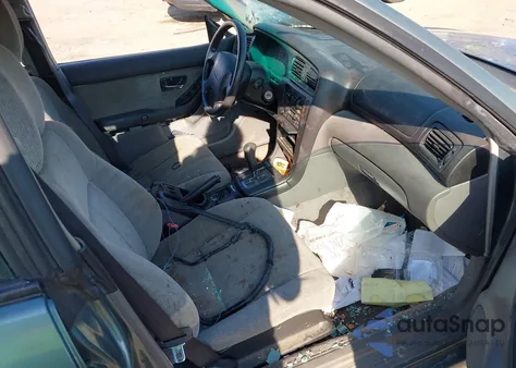 2001 Subaru Legacy L z USA, uszkodzony, nr VIN 4S3BH635117302000